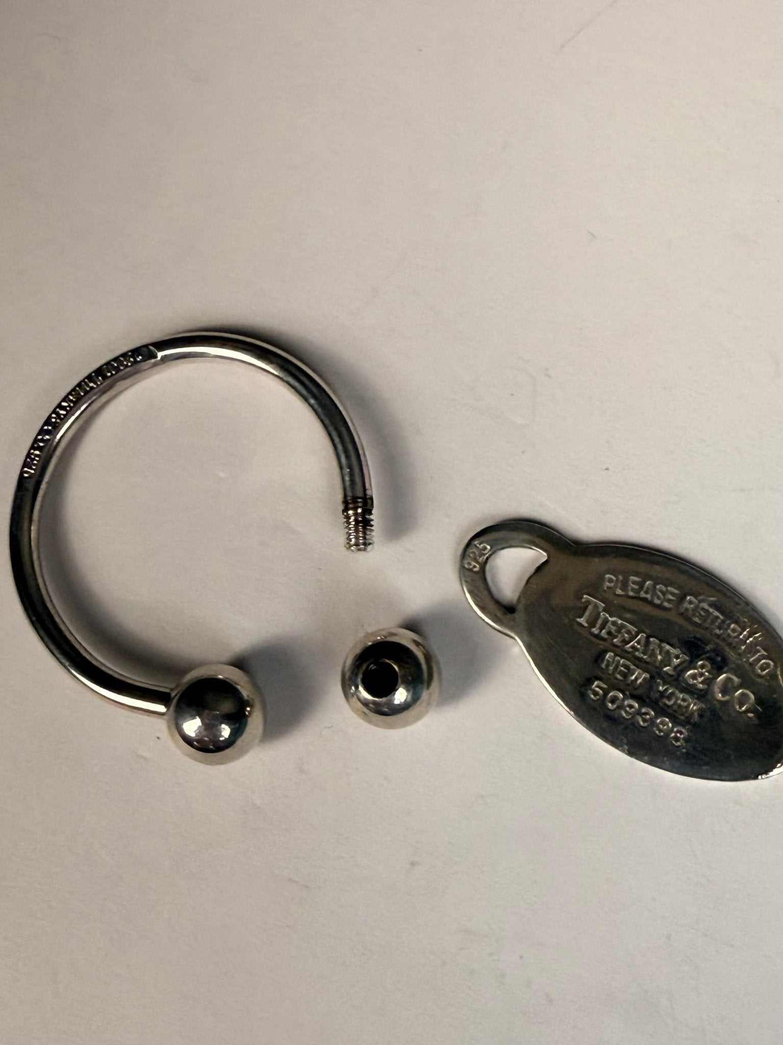 Tiffany & Co. Sterling Silver Oval Tag Key Ring Keychain | 925 Silver | 28.8g - Coyle Fine Jewelry & Timepieces